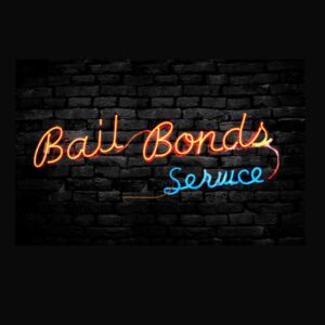 A neon Bail Bonds Service sign on a brick wall